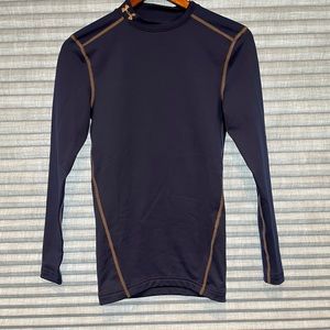 Under armour blue compression shirt small size fits medium. Never worn.